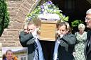 David Allen's coffin is carried out of St Mary's Church on Tuesday