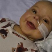 Smiling Max inspires community as wait for liver transplant begins