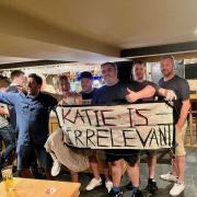 Katie Hopkins at the Star Inn with a sign which had been left outside by demonstrators