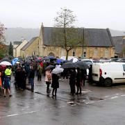 Remembrance Day gathering by the War Memorial in Wotton-under-Edge. Photo by Jeff Walshe