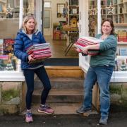 Read With Me founder Linda Cohen with Cathy outside The Cotswold Book Room in Wotton