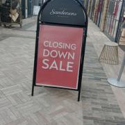 Closing down sale sign appears outside Sanderson's in Five Valleys Shopping Centre