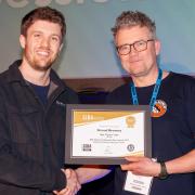 Ben Jennison-Phillips of Stroud Brewery receiving Beer X gold award