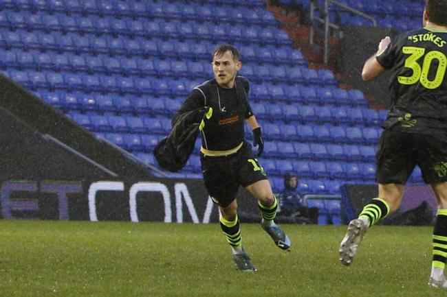 Forest Green sub George Williams takes his shirt off after his late goal at Oldham  Pic: Pro Sports Images