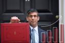 Chancellor of the Exchequer Rishi Sunak holds his ministerial 'Red Box' outside 11 Downing Street