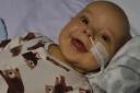 Smiling Max inspires community as wait for liver transplant begins