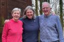 Laura Kerby, pictured with her parents, is taking on a 100km challenge following her father's cancer diagnosis