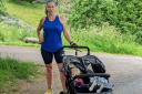 Liz Grange with her youngest son Jude, in training for an ultramarathon.