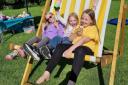 Chloe, Roxy & Ilse enjoy the sun in a giant deck chair