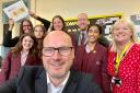 Headteacher Mark McShane plus Karen Morris, from Sopra Steria, Charlotte Smith, from Cynam, and assistant head Terry Watts, along with pupils as school gets CyberFirst Gold Award