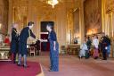 Indigo Redfern receiving her MBE from Princess Anne at Windsor Castle