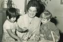 Betty Sims with two children