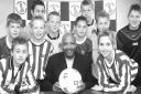 PLANS: Former footballer Cyrille Regis at Worcester’s St George’s Lane with some of the boys who will be playing in the new Midland Junior Premier League