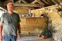 Jeremy Clarkson in front of the bar at Diddly Squat farm