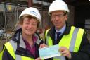 Standard editor John Wilson hands over a £6,000 cheque to Sue Coakley, chairwoman of the Lechlade Memorial Hall fundraising committee