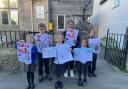 Pupils from Kingswood Primary with their road safety posters