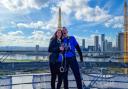Naomi Hughes and Rhys Coates climbed down the 02 arena to raise money for Heart Heroes who supported them when daughter Martha-Mai was born