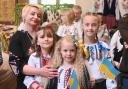 MAY 18 2024

Copyright Photographer Simon Pizzey 

Ukranian school teacher Iryna Shcheretska with pupils Yeva,Daryna,and Iryna, 

First Ukranian  Vyshyvanka Day, Stroud, St.Laurence Church.