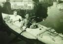 Les Pugh with young Michael canoeing at Saul Junction on the Gloucester and Sharpness Canal in 1949.