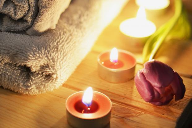Stroud News and Journal: A pile of towels, candles and a tulip. Credit: Canva