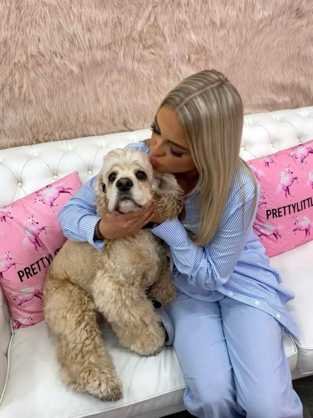 Stroud News and Journal: Olivia Bendell kissing her dog Teddie on the head (PrettyLittleThing)