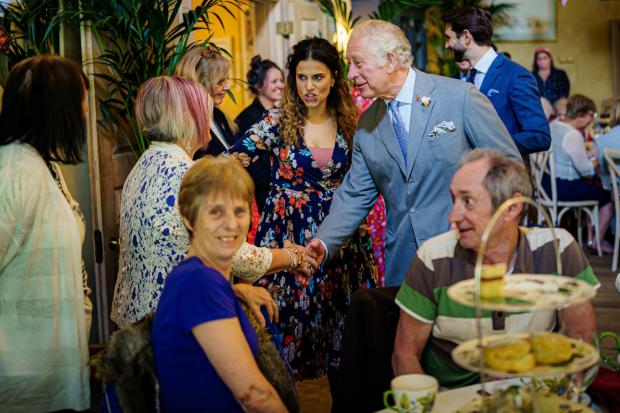 Stroud News and Journal: The Prince of Wales meets invited guests during a Jubilee tea dance 