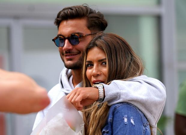 Stroud News and Journal: Love Island winners Davide Sanclimenti and Ekin-Su Culculoglu arrive at Stansted Airport in Essex. (PA)