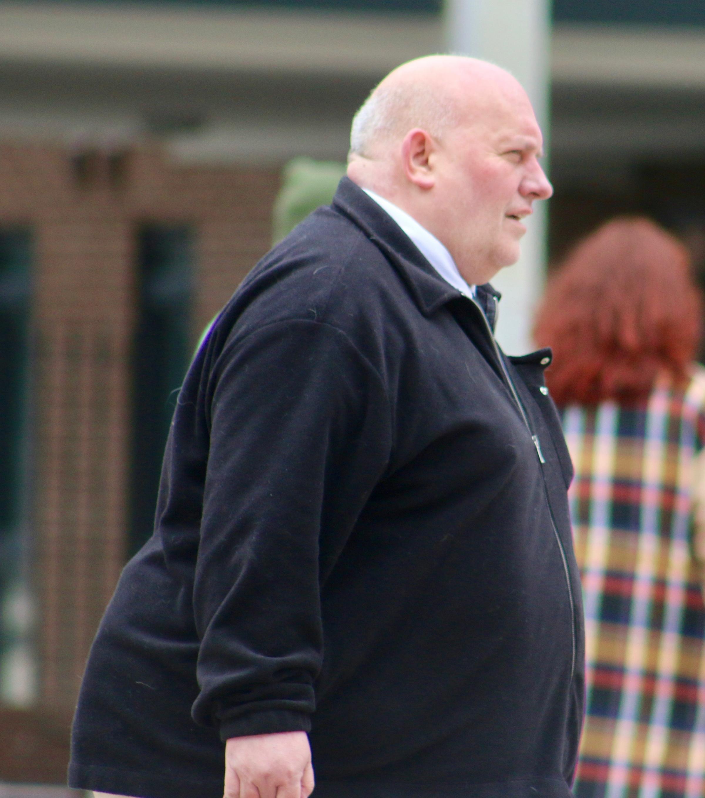 Terrence Bann leaving Liverpool Crown Court with a suspended prison sentence