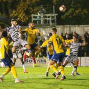Forest Green Rovers Jordan Moore-Taylor(15) heads the ball over the bar during the FA Cup match between St Albans FC and Forest Green Rovers at Clarence Park, St Albans, United Kingdom on 7 November 2021.