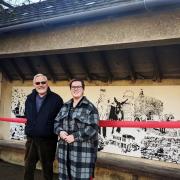 Stroud artist Jessy Plant and Chalford Parish Council chair Paul Lilly at the official opening of the bus shelter. Image: Chalford Parish Council & Jessy Plant
