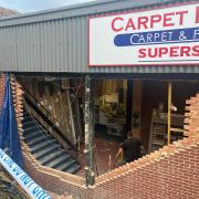 Car crash leaves large hole in wall of Stroud family business
