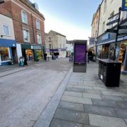 An artist's impression of a proposed BT Street Hub in Stroud high street outside Greggs 