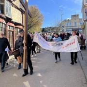 The Christians Together group walking down the high street taking part in the Walk of Witness