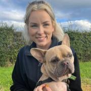 Care assistant Beth Barker with Crumpet, the two-year-old French bulldog aged two