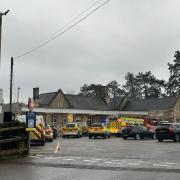 Police cars outside Kemble station after an incident