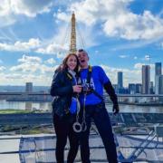 Naomi Hughes and Rhys Coates climbed down the 02 arena to raise money for Heart Heroes who supported them when daughter Martha-Mai was born