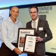 Steve Edwards receives his Sporting Hero award from the Newsquest Gloucestershire’s head of media sales Carl Badham