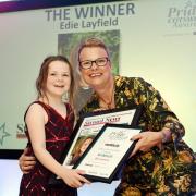 Child of the Year, Edie Layfield, receives her award from Newsquest events director Sue Griffiths
