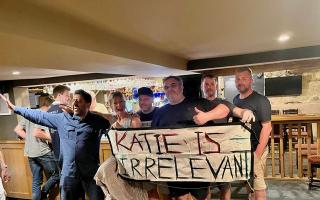 Katie Hopkins at the Star Inn with a sign which had been left outside by demonstrators
