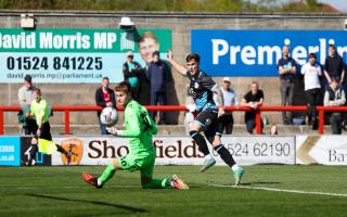 In pictures as Forest Green beat Morecombe 2-1 away in their first game since relegation. Pro Sports Images